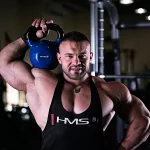 Kettlebell żeliwny HMS KNV24 z powłoką winylową 24 kg - niebieski 